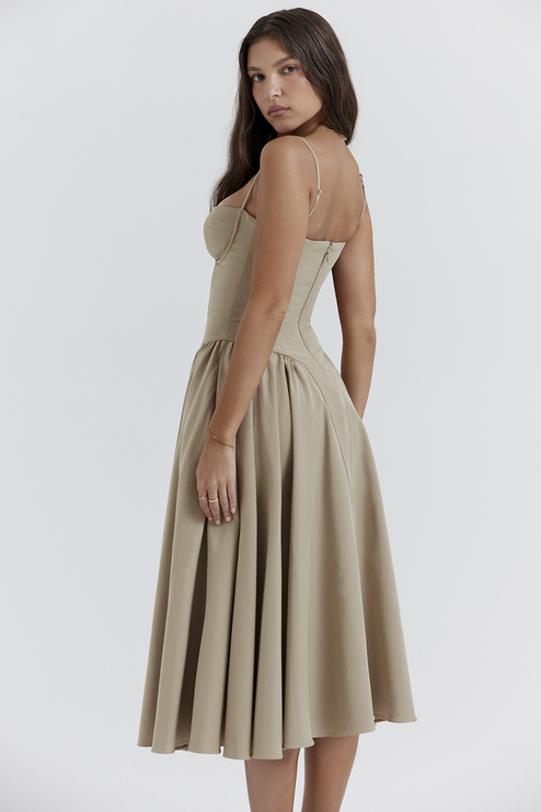 Back three-quarter view of the women's light khaki sweetheart neck corset midi dress, showcasing the fitted waist.