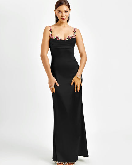 Front view of a black formal maxi dress with a sophisticated cowl neck and vibrant floral embroidered straps.