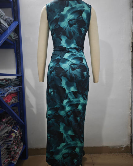 Side profile of a women's form-fitting midi dress featuring a teal and black gradient floral design.