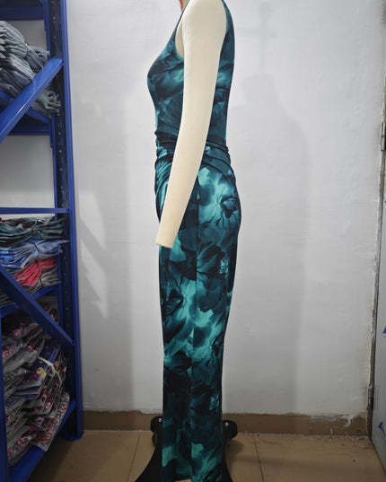 Front view of a woman wearing a brown and black gradient print crew neck midi dress with a ruched bodice.
