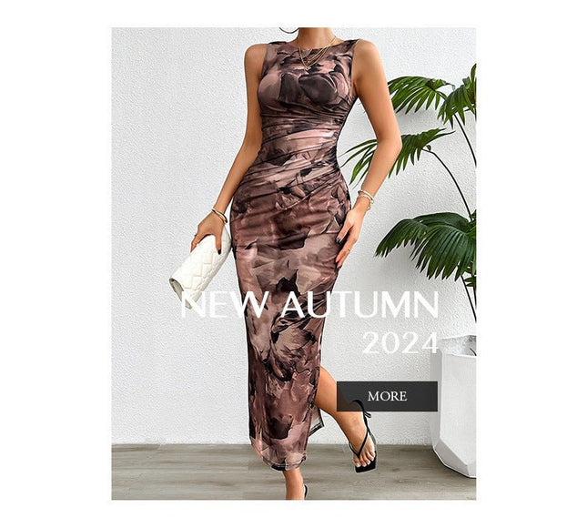 Full-length front view of a woman in a brown and black gradient print sleeveless midi dress, standing.