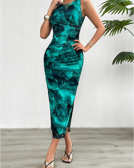 Sleeveless green gradient print crew neck midi dress with ruched detailing, paired with clear strap black heels.