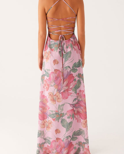 Detailed back view of the women's pink floral maxi dress, focusing on the criss cross strap design.