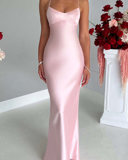 Front view of a light pink satin maxi dress with spaghetti straps and a sweetheart neckline, for wedding suits for women.