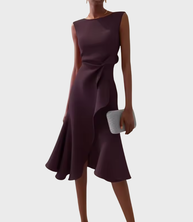Sleeveless draped asymmetric midi dress in a rich burgundy shade, with a subtle side ruffle detail. for a woman's suit dress alternative.