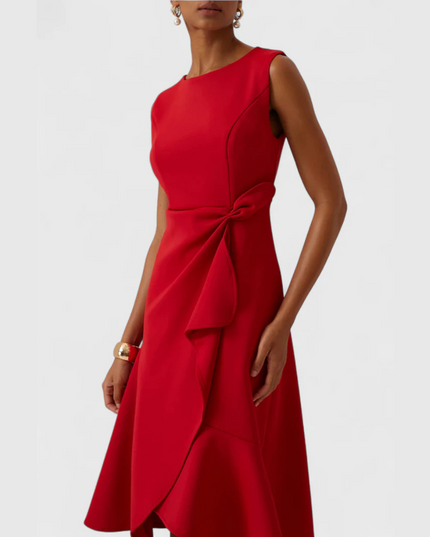 Close-up front view of a women's bright red sleeveless midi dress with a unique draped, knotted waist detail.