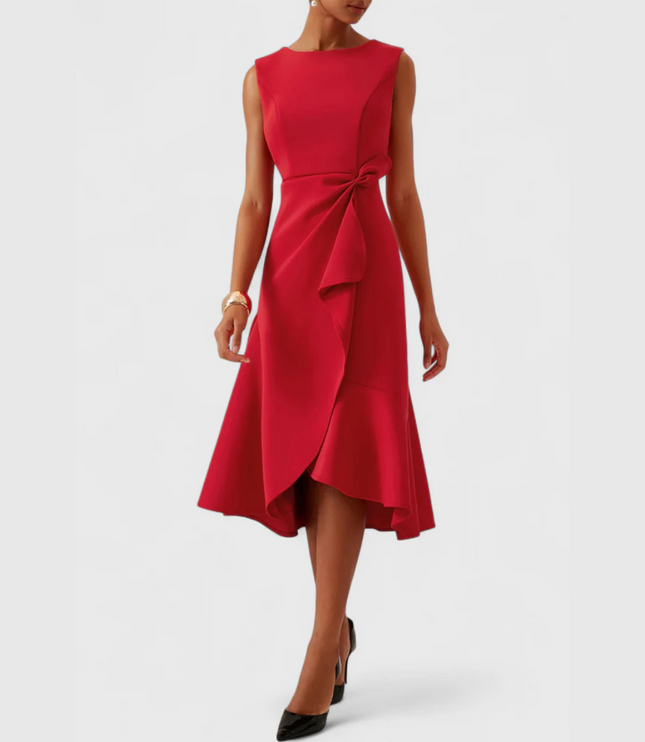 Full front view of a women's vibrant red sleeveless draped asymmetric midi dress, styled with black heels.