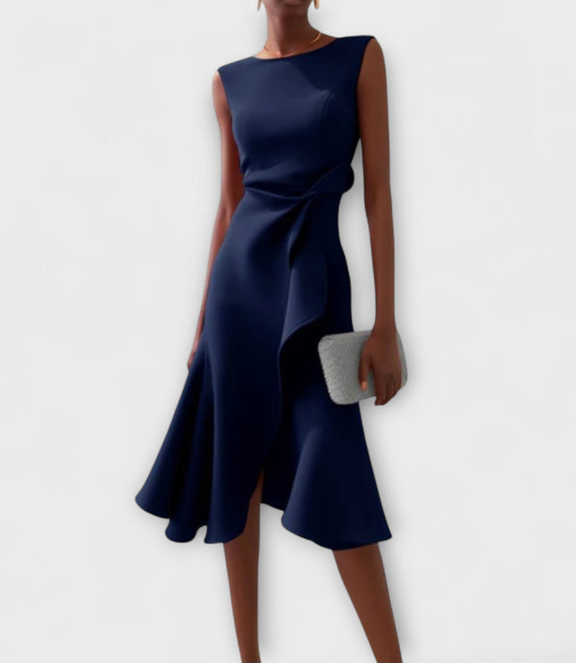Elegant navy blue sleeveless midi dress with a unique draped asymmetric design and a subtle side ruffle, ideal for women's formal wear.