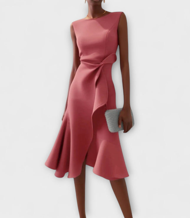 Stylish rose pink sleeveless midi dress for women, showcasing a draped asymmetric skirt and a cinched waist with ruffle detail.
