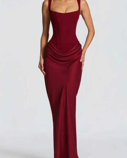 Elegant burgundy square neck corset maxi dress for women, featuring a draped waist and flowing skirt.