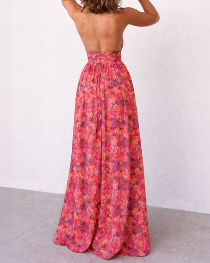 Back view of the women's summer floral halter neck maxi dress, showcasing the open back design and full skirt.
