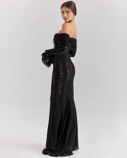 Side profile of a women's black off-shoulder floral lace maxi dress, showing the flowing skirt and long sleeves.