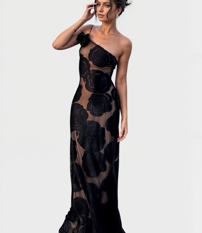 Women's one-shoulder black rose floral maxi dress, fitted silhouette with sheer details, front view.