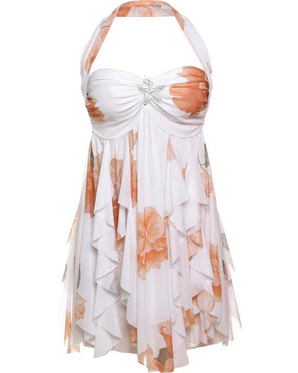 Flat lay of a white halter neck mini dress with orange floral print and ruffled layers.