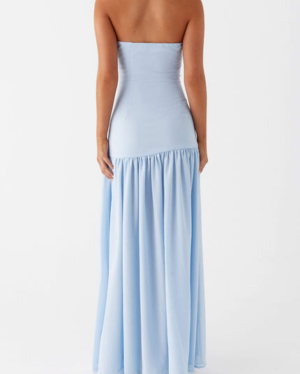 Back view of the light blue strapless maxi dress, showing the smooth fabric and ruffled detail.