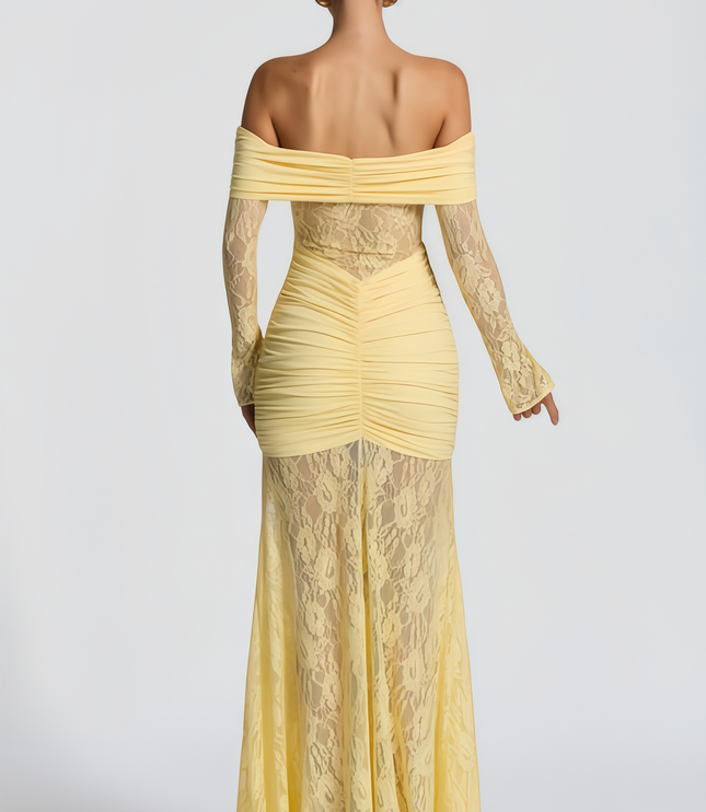 Back view of the women's yellow off-shoulder maxi dress, showing ruched details and sheer lace skirt.