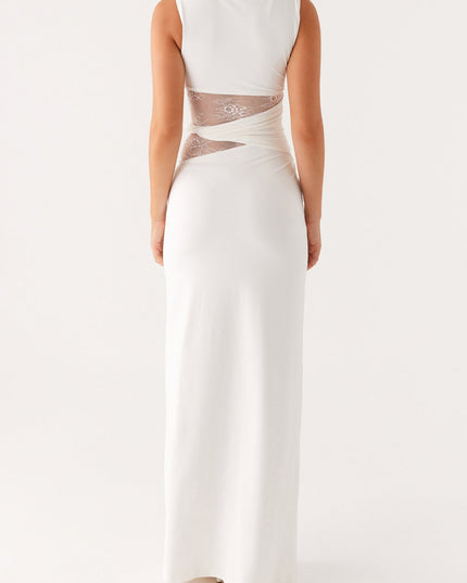 Back view of the white sleeveless crew neck maxi dress, highlighting the lace panel detail on the back.
