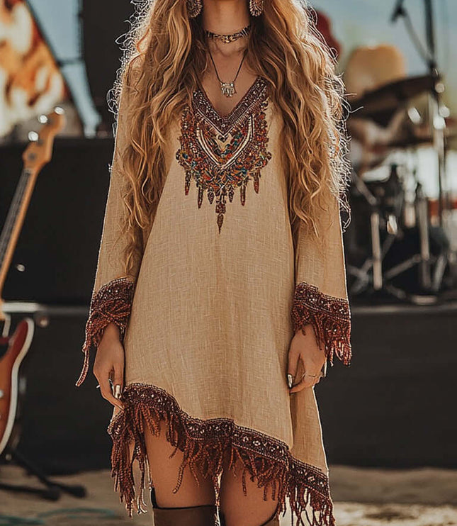 Front view of a women's tan embroidered fringe V-neck long sleeve mini dress, for a casual suit dress look.