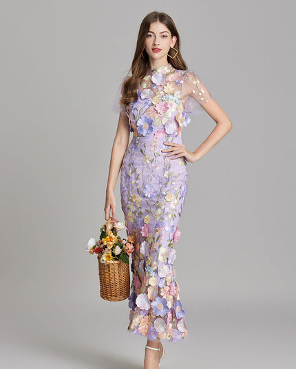 Front view of a women's lavender floral embroidered sheer maxi dress, as a prom dress or for special occasions.