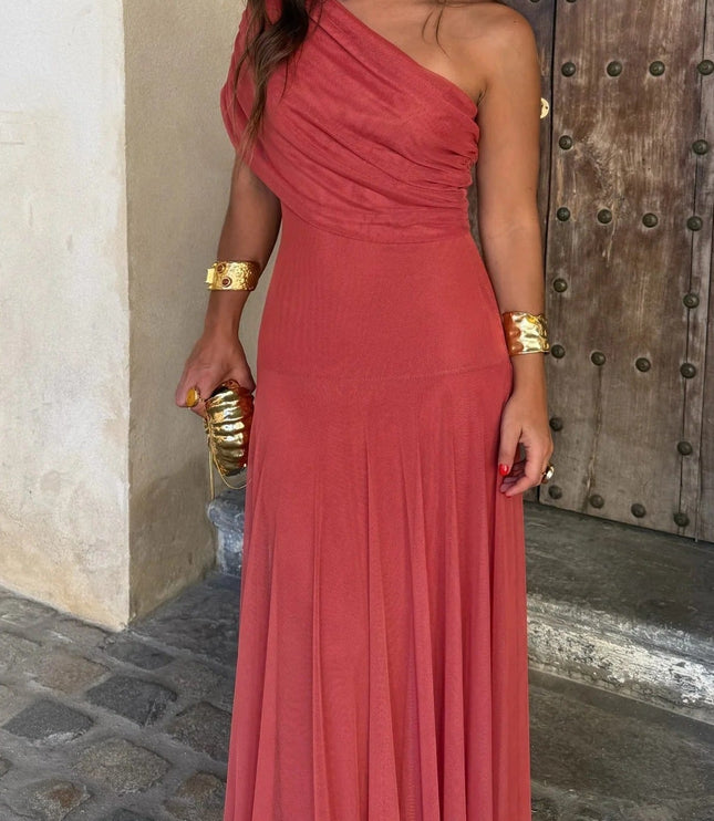 Women's coral red one shoulder drape mesh maxi dress, featuring a fitted bodice and flowing skirt.