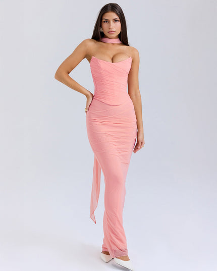 Front view of the women's pink strapless mesh ruched maxi dress, highlighting the elegant silhouette and draped fabric.