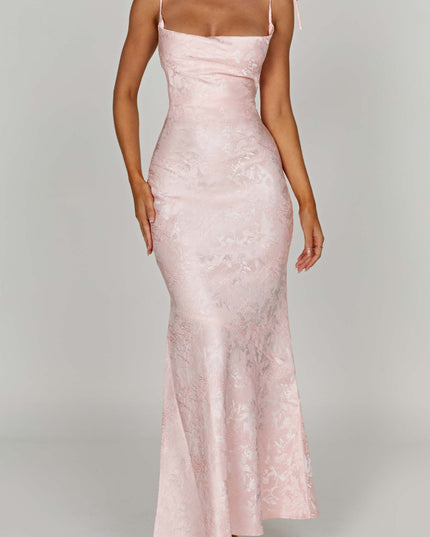 Front view of the women's pink floral tie-strap maxi dress, showcasing the full length and subtle textured pattern.