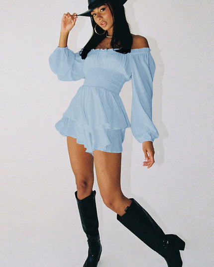 Full body shot of light blue off-shoulder mini dress with long sleeves and black boots