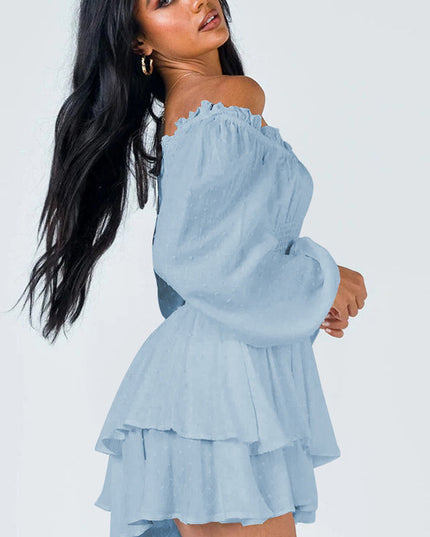 Side profile of light blue off-shoulder mini dress, showing tiered skirt and flowing sleeves