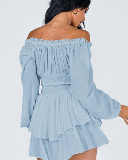 Back view of light blue off-shoulder mini dress, showcasing shirred back and tiered ruffles