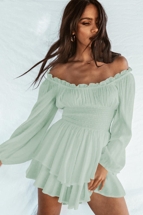 Light green off-shoulder mini dress with long puff sleeves, shirred bodice, and ruffled hem
