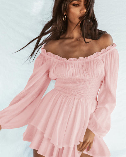 Front view of a women's light pink off-shoulder mini dress with long sleeves and a ruffled skirt