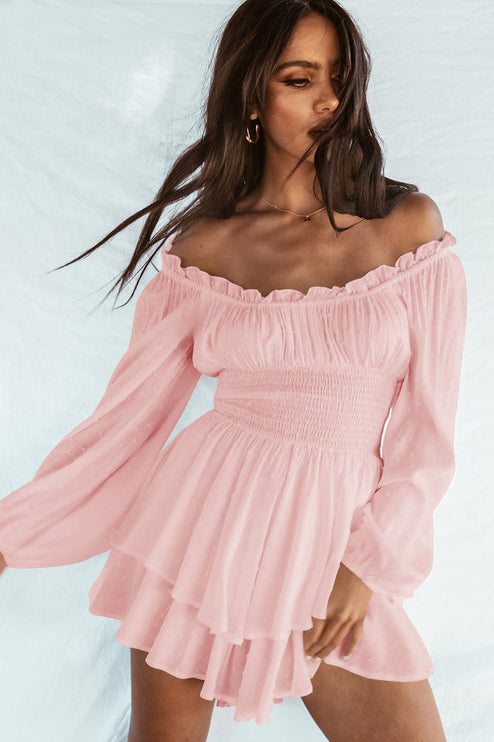 Front view of a women's light pink off-shoulder mini dress with long sleeves and a ruffled skirt
