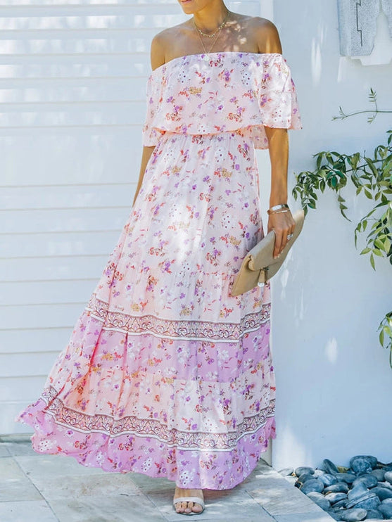 Flowing light pink floral off-shoulder ruffled maxi dress with a tiered skirt, for spring.