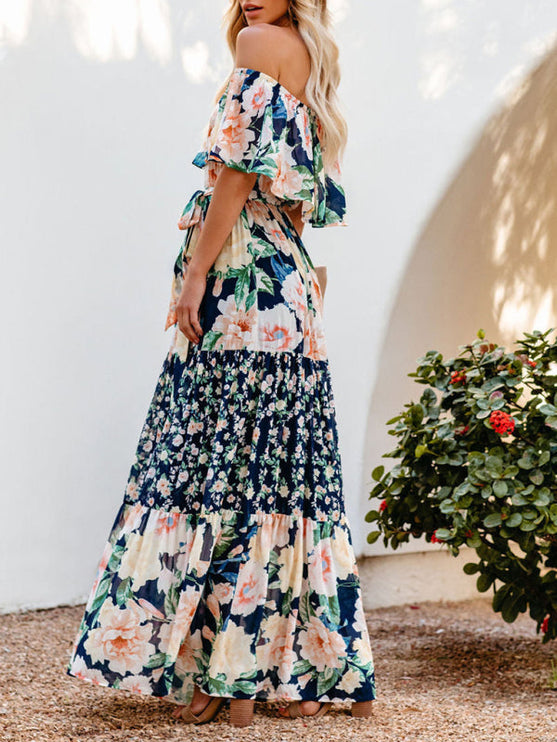 Side profile of the women's off-shoulder ruffled floral maxi dress, highlighting the tiered design and cinched waist.