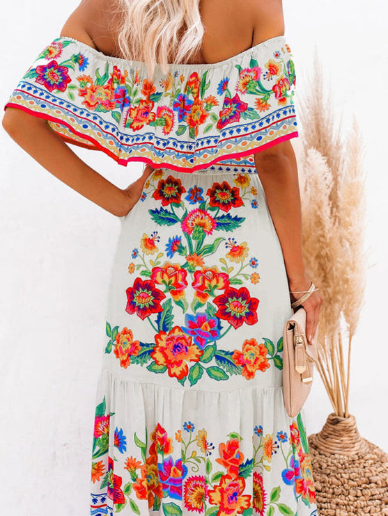Back view detail of the women's off-shoulder white floral maxi dress, showing the ruffled neckline and vibrant print.