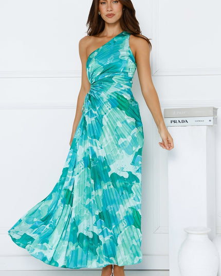 Women's elegant one shoulder maxi dress in a teal and aqua floral print, featuring a pleated skirt and waist cutout.