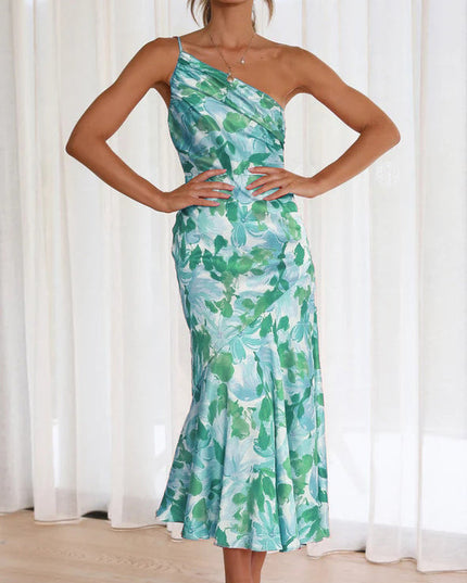 Front view of women's floral one shoulder ruched bust midi dress in green and light blue.