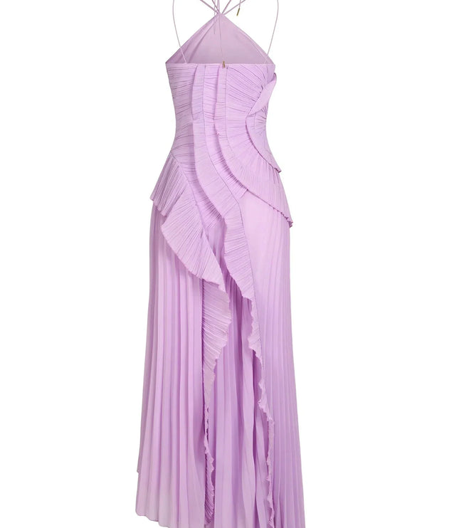 Back view of a lavender one-shoulder ruffle midi dress with a pleated skirt and adjustable halter straps.