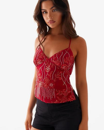 Side view of a red sequin V-neck party cami top featuring delicate floral and vertical beaded patterns.