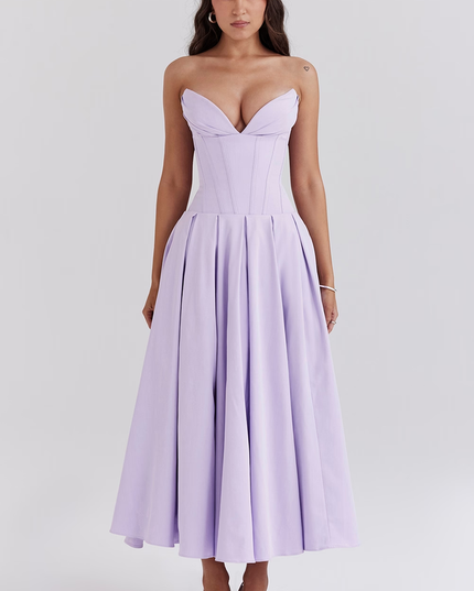 Full length view of a women's strapless boned bodice pleated midi dress in light lavender