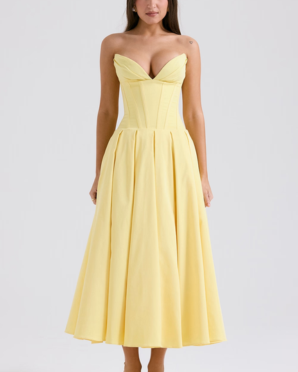 Front view of a women's strapless boned bodice pleated midi dress in light yellow