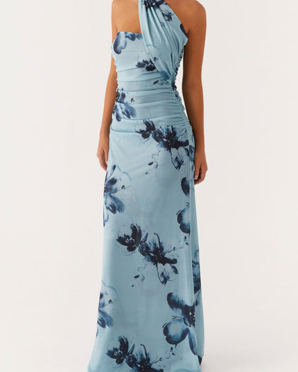 Elegant light blue floral strapless ruched maxi dress with a unique draped neckline, showcasing the dark blue flower design.