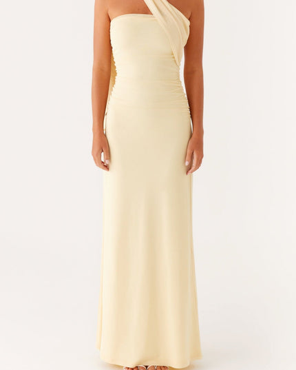 Front view of a women's pale yellow strapless maxi dress with a draped neck scarf and ruched bodice.