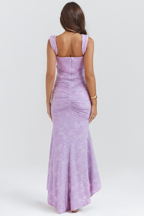 Back view of the light purple floral ruched off-shoulder maxi dress, showing the full length and delicate floral texture.
