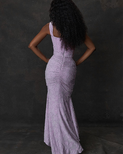 Back view of the women's light lavender floral ruched maxi dress, showing the fitted bodice and flowing mermaid skirt.