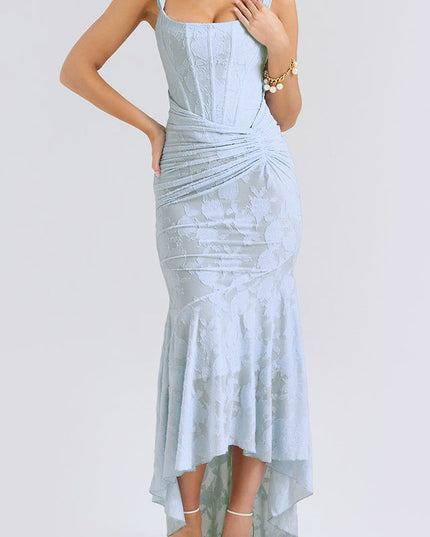 Front view of a women's light blue floral ruched maxi dress with a square neckline, corset-style bodice, and high-low hem.
