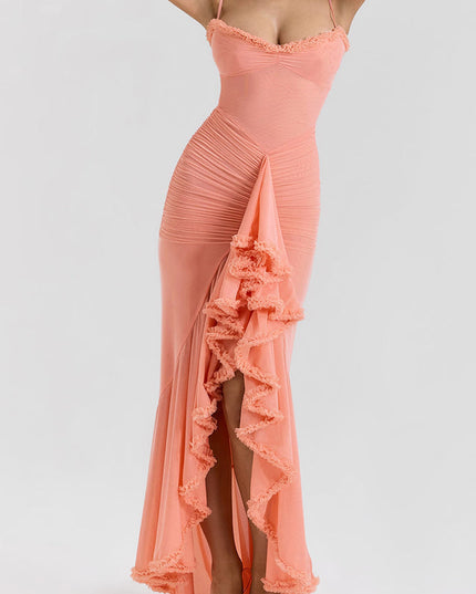 Full-length view of a peach women's prom ruffled front maxi dress with spaghetti straps and a body-hugging silhouette.