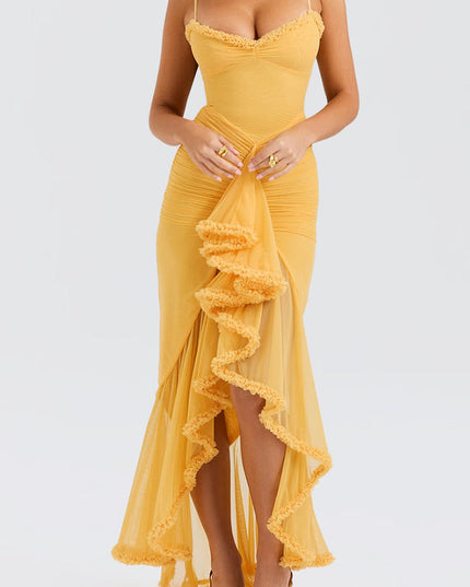 Close-up front view of the yellow ruffled maxi dress, highlighting the intricate front ruffles and ruched details on the bodice.