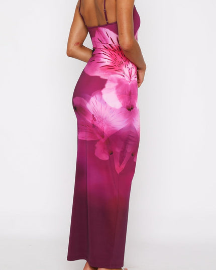 Back view of women's floral scoop neck spaghetti strap maxi dress, showcasing the magenta fabric and pink flower print.
