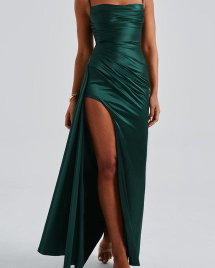 Front view of a shimmering green cowl neck dress, showcasing the draped fabric and long silhouette.